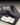 Premium corporate gifting idea of ink illustration print packed in black envelope with a bow, card with custom meassage, and 'BRAND HERE' placeholder.